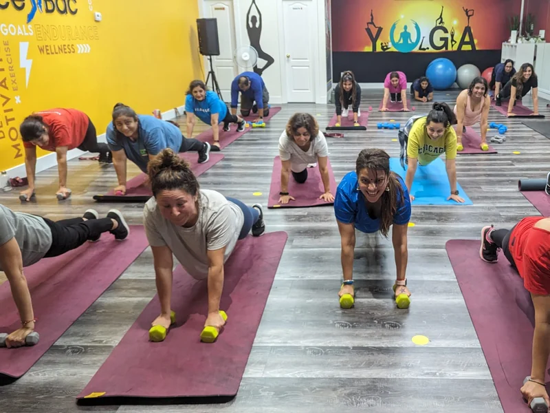 Fitness class in action - strength training